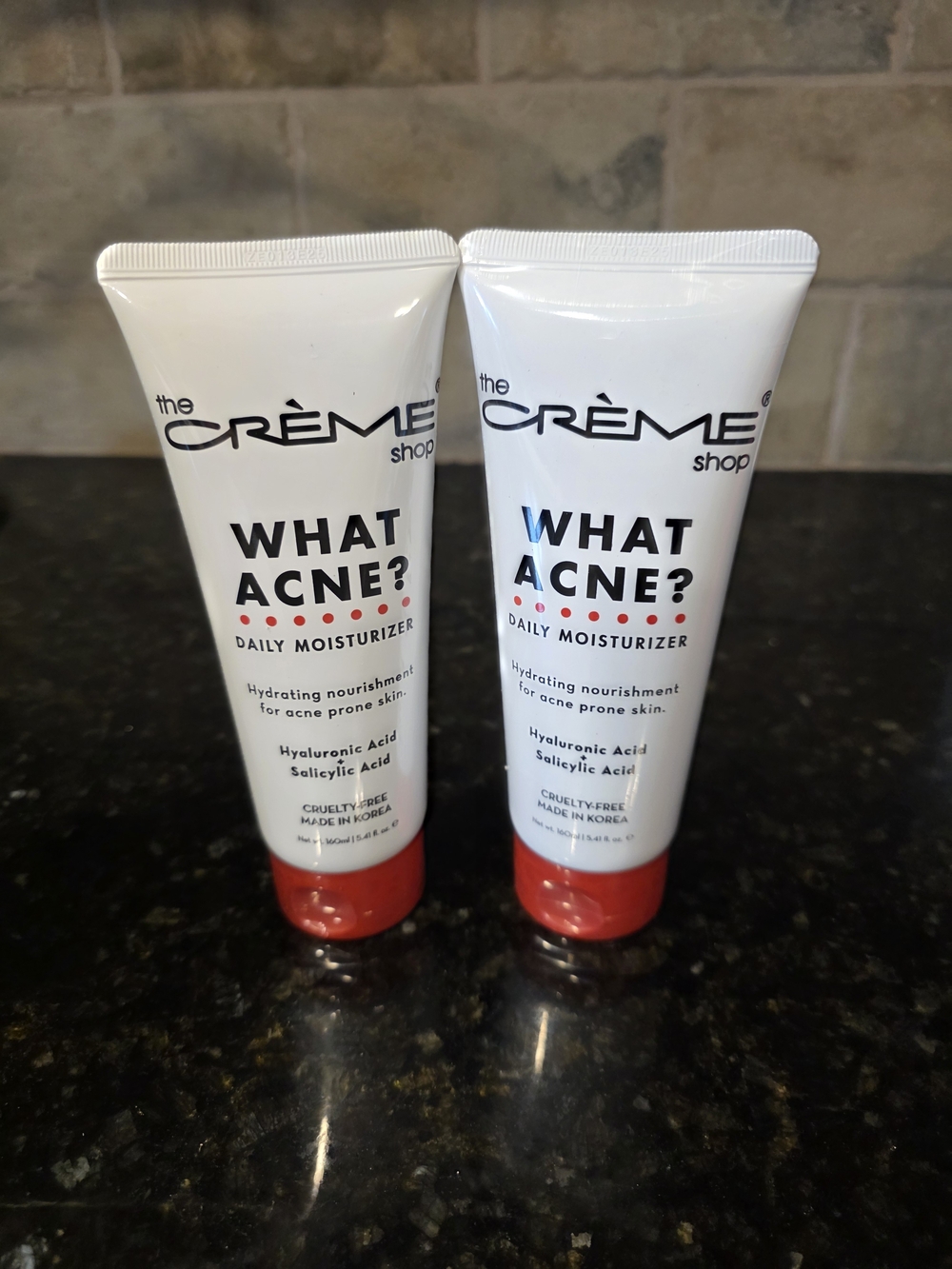 The Crème Shop What Acne? Daily Moisturizer - White & Red